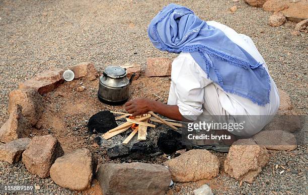 making a fire - sinai egypt stock pictures, royalty-free photos & images