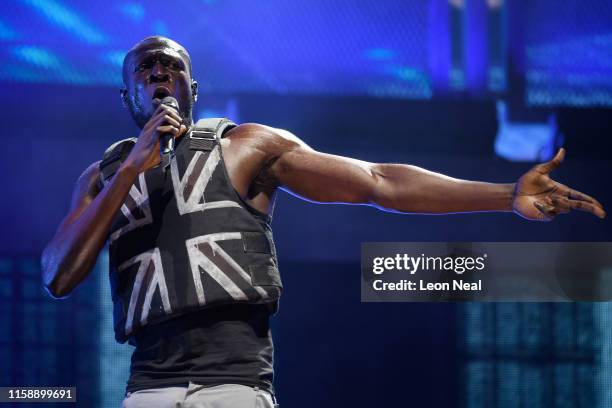 Stormzy performs in the headline slot on the Pyramid Stage on day three of Glastonbury Festival at Worthy Farm, Pilton on June 28, 2019 in...