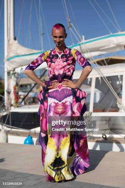 Guest is seen on the street attending 080 Barcelona Fashion Week wearing pink/purple dress on June 28, 2019 in Barcelona, Spain.