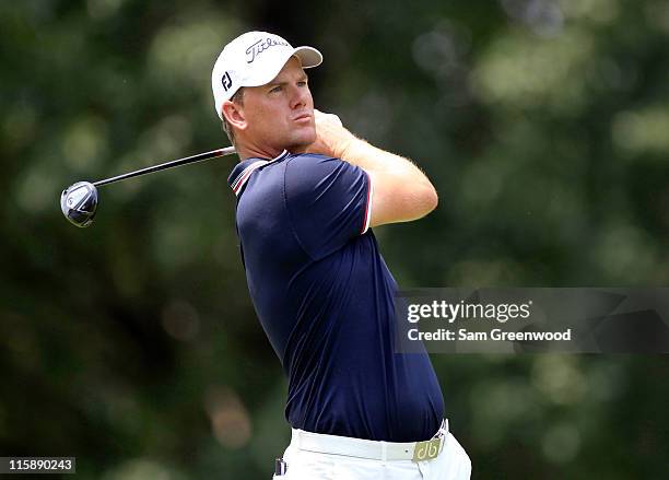 Robert Karlsson of Sweden hits a shot on the 7th hole during the third round of the FedEx St. Jude Classic at TPC Southwind on June 11, 2011 in...