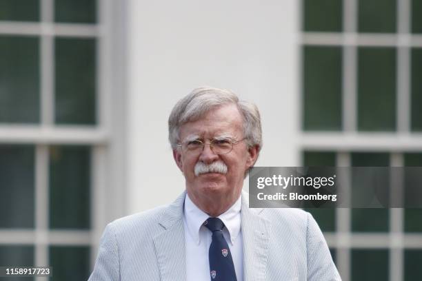 John Bolton, national security adviser, pauses outside the White House in Washington, D.C., U.S., on Wednesday, July 31, 2019. The White House today...