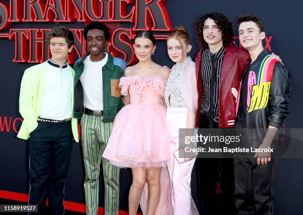 Gaten Matarazzo, Caleb McLaughlin, Millie Bobby Brown, Sadie Sink, Finn Wolfhard, and Noah Schnapp attend the premiere of Netflix's "Stranger Things"...