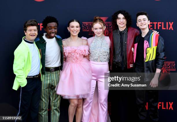 Gaten Matarazzo, Caleb McLaughlin, Millie Bobby Brown, Sadie Sink, Finn Wolfhard, and Noah Schnapp attend the premiere of Netflix's "Stranger Things"...