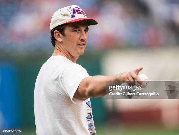 Actor Miles Teller throws the ceremonial first pitch at the San Francisco Giants vs Philadelphia Phillies game at Citizens Bank Park on July 31, 2019...