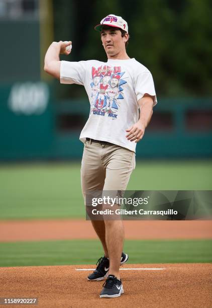 Actor Miles Teller throws the ceremonial first pitch at the San Francisco Giants vs Philadelphia Phillies game at Citizens Bank Park on July 31, 2019...