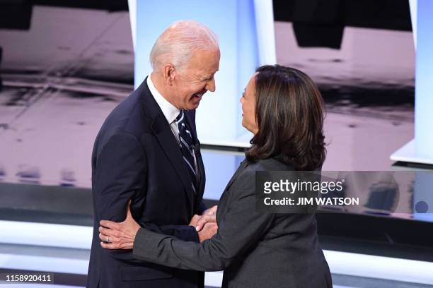 Democratic presidential hopefuls former Vice President Joe Biden and US Senator from California Kamala Harris greet each other ahead of the second...