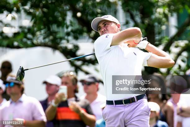Justin Thomas plays his shot from the 13th tee during the final round of the World Golf Championships - FedEx St. Jude Invitational on July 28, 2019...