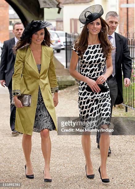Pippa Middleton and Catherine, Duchess of Cambridge attend the wedding of Sam Waley-Cohen and Annabel Ballin at St. Michael and All Angels church on...