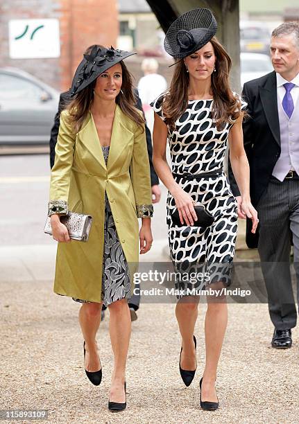 Pippa Middleton and Catherine Duchess of Cambridge attend the wedding of Sam Waley-Cohen and Annabel Ballin at St. Michael and All Angels church on...