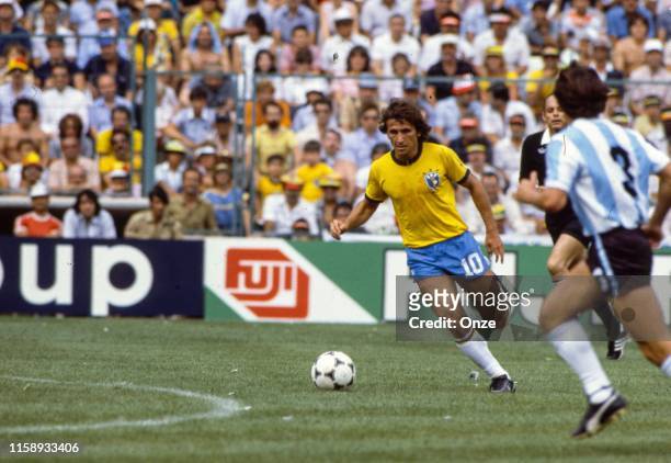 Zico of Brazil and Juan Barbas of Brazil during the World Cup match between Argentina and Brazil in Stade de Saria at Barcelona on the 02 july 1982.