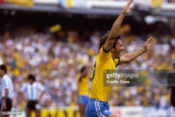 Zico of Brazil celebrate his goal during the World Cup match between Argentina and Brazil in Stade de Saria at Barcelona on the 02 july 1982.