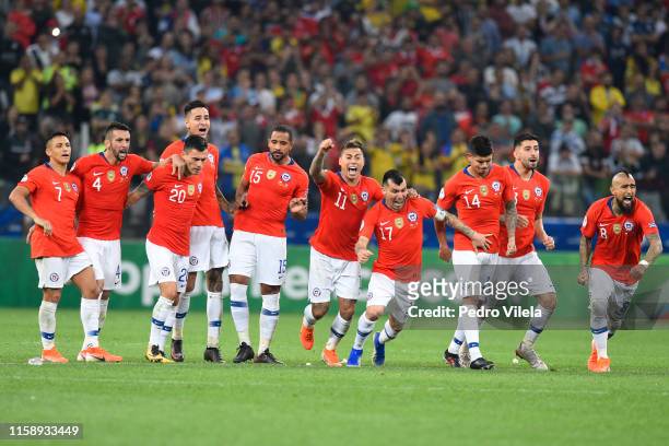 Players of Chile celebrate after winning during a penalty shootout after the Copa America Brazil 2019 quarterfinal match between Colombia and Chile...