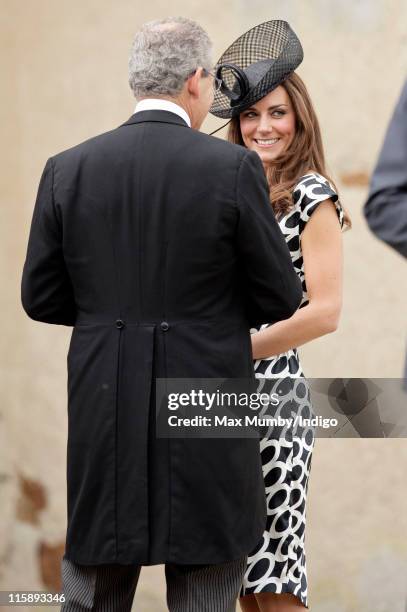 Catherine, Duchess of Cambridge attends the wedding of Sam Waley-Cohen and Annabel Ballin at St. Michael and All Angels church on June 11, 2011 in...