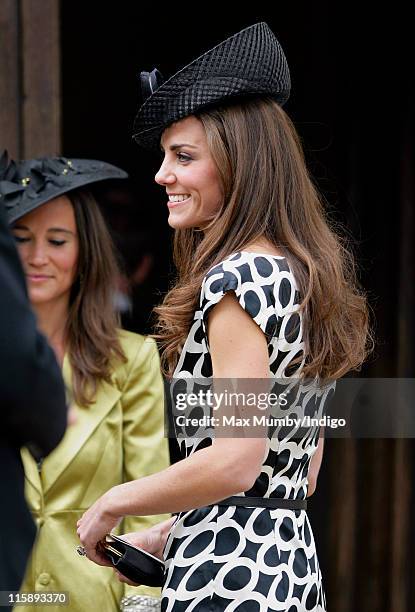 Catherine, Duchess of Cambridge attends the wedding of Sam Waley-Cohen and Annabel Ballin at St. Michael and All Angels church on June 11, 2011 in...