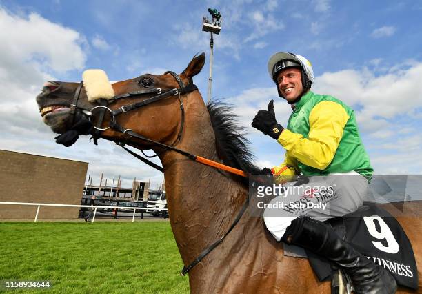 Galway , Ireland - 1 August 2019; Jockey Robbie Power celebrates after riding Tudor City to victory in the Guinness Galway Hurdle Handicap on Day...