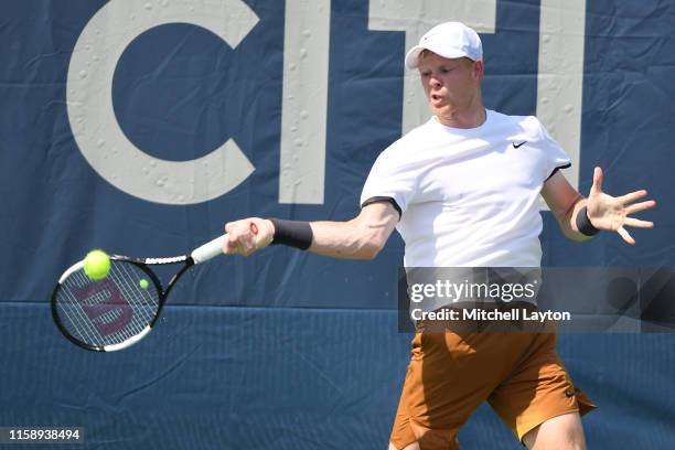 Kyle Edmund of Great Britain returns a shot from Jo-Wilfried Tsonga of France during Day 3 of the Citi Open at Rock Creek Tennis Center on August 1,...