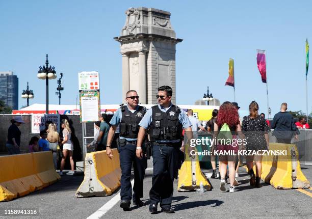 Chicago Police officers monitor the area outside of the Lollapalooza, the annual 4-day music festival in Chicago, Illinois, August 1, 2019.