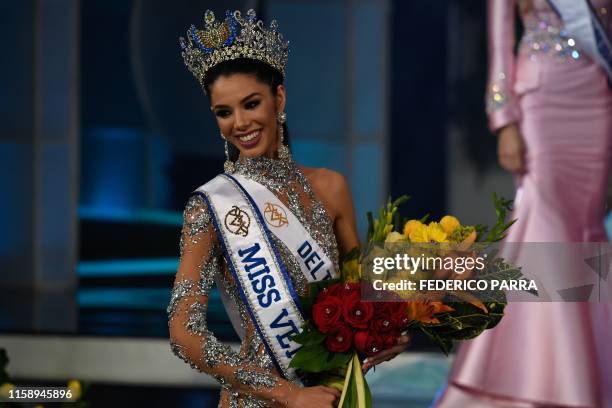 Thalia Olvino representative of the Delta Amacuro reacts during the Miss Venezuela beauty pageant in Caracas, Venezuela on August 1, 2019.