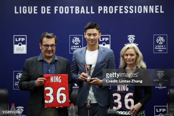 Didier Quillot, General Executive Manager of LFP, French League Promotion Ambassador Ning Zetao and President of French Professional Football League...