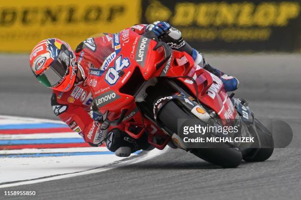 Mission Winnow Ducati's Italian rider Andrea Dovizioso competes during the first practice session of the Moto GP Grand Prix of the Czech Republic in...