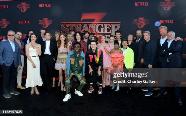 Stranger Things cast and crew pose with Netflix execs at the "Stranger Things" Season 3 World Premiere on June 28, 2019 in Santa Monica, California.