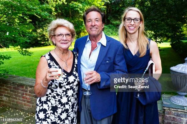 Faye Fortunato, Mathew Fortunato and Tracy Pfaff attend A Country House Gathering To Benefit Preservation Long Island on June 28, 2019 in Locust...