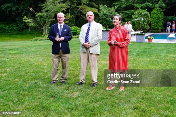 Gary Lawrance, Daniel W. White and Betsy White attend A Country House Gathering To Benefit Preservation Long Island on June 28, 2019 in Locust...