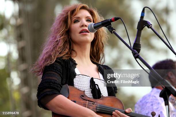 Musician Alison Krauss of Alison Krauss & Union Station featuring Jerry Douglas perform on stage during Bonnaroo 2011 at Which Stage on June 11, 2011...