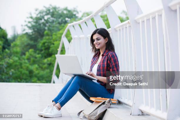 university student - stock images - indian college girls stock pictures, royalty-free photos & images