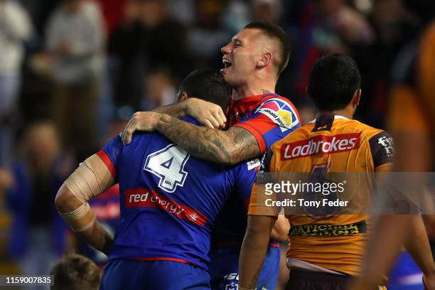 Shaun Kenny-Dowall of the Newcastle Knights celebrates a try during the round 15 NRL match between the Newcastle Knights and the Brisbane Broncos at...