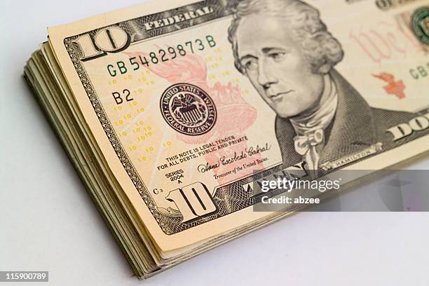 stack of ten dollar bills - ten us dollar note stock pictures, royalty-free photos & images