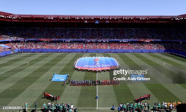 General view inside the stadium as players line up prior to the 2019 FIFA Women's World Cup France Quarter Final match between Italy and Netherlands...