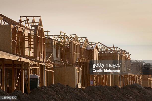 houses under construction - new housing development stock pictures, royalty-free photos & images