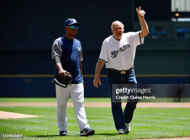 Green Bay Packers hall of famer Jerry Kramer throws a ceremonial first pitch before the game between the Milwaukee Brewers and the Seattle Mariners...