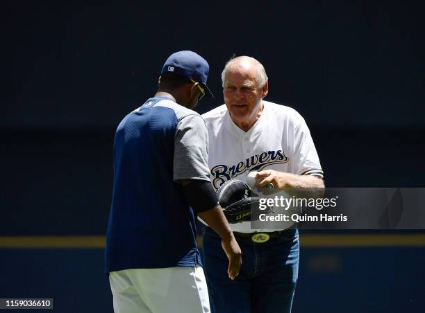 Green Bay Packers hall of famer Jerry Kramer throws a ceremonial first pitch before the game between the Milwaukee Brewers and the Seattle Mariners...