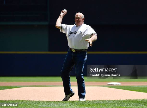 Green Bay Packers hall of famer Jerry Kramer throws a ceremonial first pitch before the game between the Milwaukee Brewers and the Seattle Mariners...