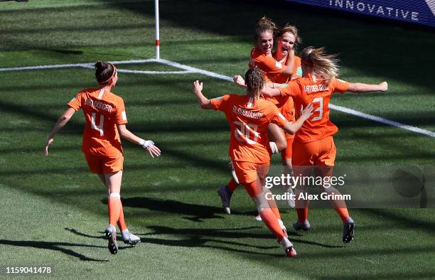 Vivianne Miedema of the Netherlands celebrates with teammates after scoring her team's first goal during the 2019 FIFA Women's World Cup France...