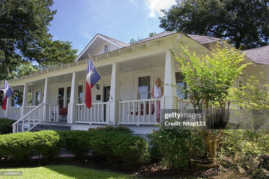 Old historical home in southern USA. Front porch. Woman. Texas.