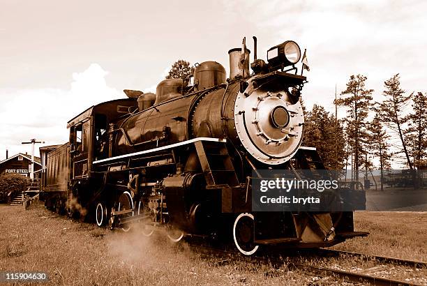 sepia steam locomotive, fort steele heritage town,british columbia,canada. - history and progress of the steam engine stock pictures, royalty-free photos & images