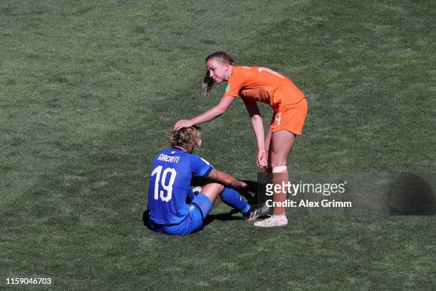 Valentina Giacinti of Italy is consoled by Jackie Groenen of the Netherlands during the 2019 FIFA Women's World Cup France Quarter Final match...