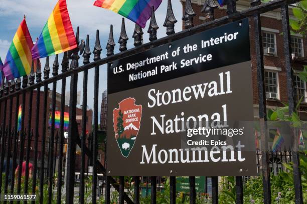 Sign marking the spot of the Stonewall National monument in Greenwich Village, New York - the Stonewall Inn was the scene of riots in 1969 which was...