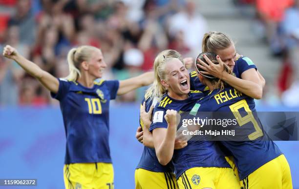 Stina Blackstenius of Sweden celebrates as he scores her team's second goal with team mates during the 2019 FIFA Women's World Cup France Quarter...