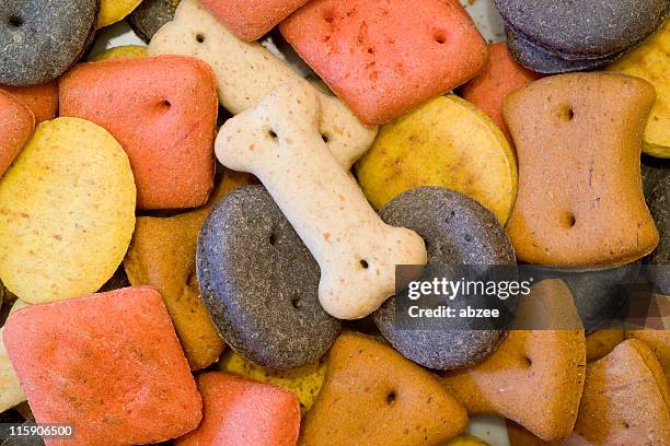 dog biscuits close up - dog biscuit stock pictures, royalty-free photos & images