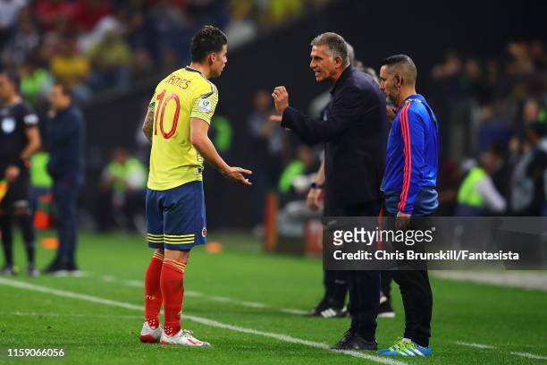 Colombia coach Carlos Queiroz makes a point to James Rodriguez during the Copa America Brazil 2019 quarterfinal match between Colombia and Chile at...