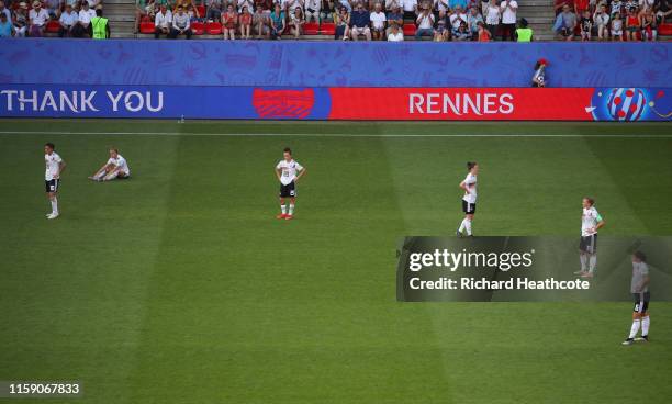 Germany players look dejected at full-time after the 2019 FIFA Women's World Cup France Quarter Final match between Germany and Sweden at Roazhon...