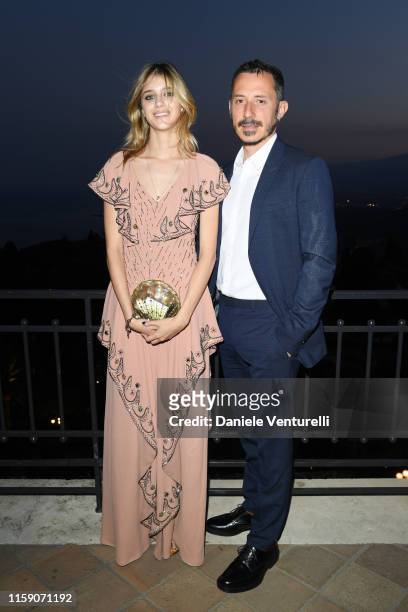 Benedetta Porcaroli and Michele Alaique attend the Nastri D'Argento cocktail party in Taormina on June 29, 2019 in Taormina, Italy.
