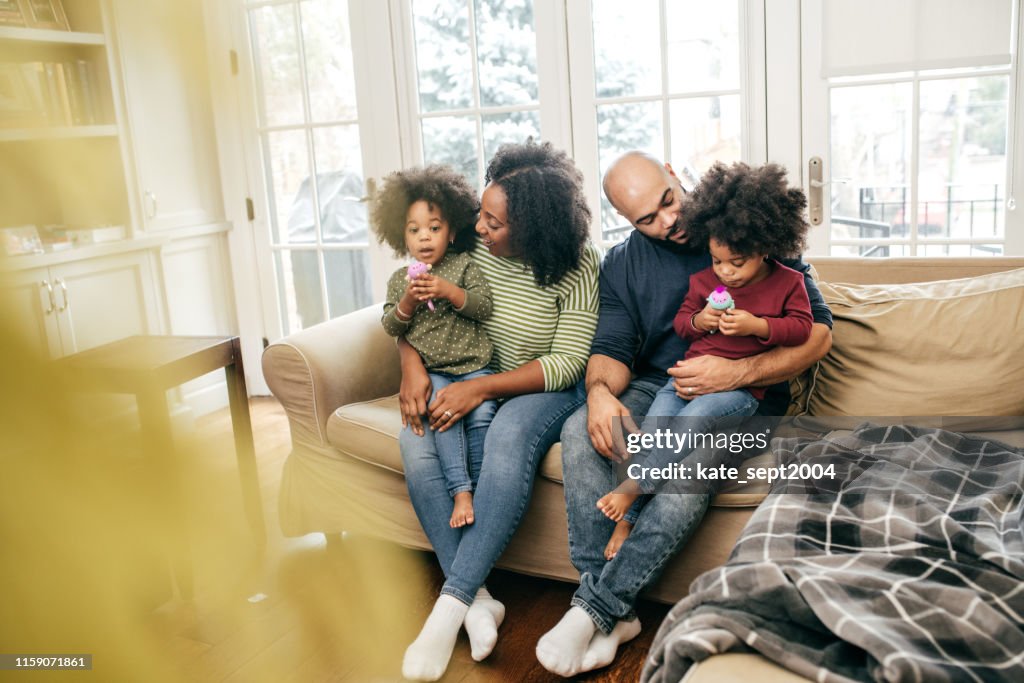 Family at home with two kids