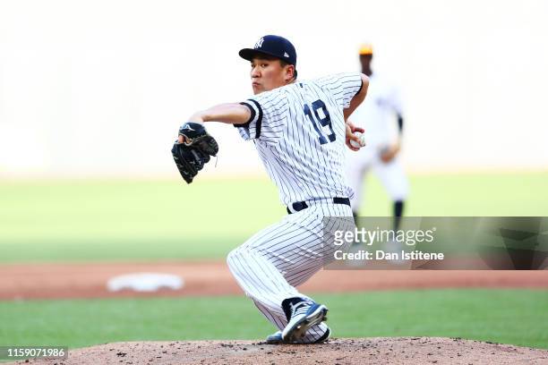 Masahiro Tanaka of the New York Yankees pitches during the MLB London Series game between Boston Red Sox and New York Yankees at London Stadium on...