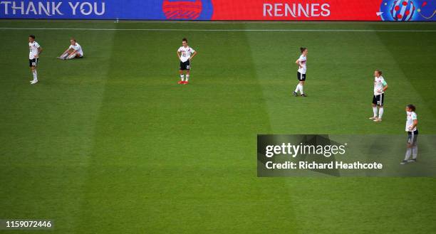 Germany players look dejected at full-time after the 2019 FIFA Women's World Cup France Quarter Final match between Germany and Sweden at Roazhon...