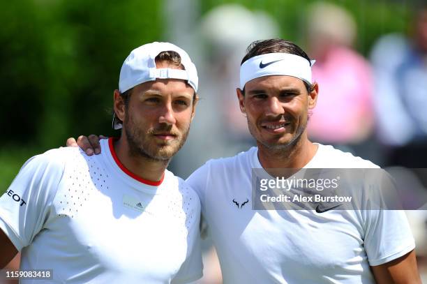 Rafael Nadal of Spain and Lucas Pouille of France pose for a photo prior to their men's singles exhibition match during the Aspall Tennis Classic at...